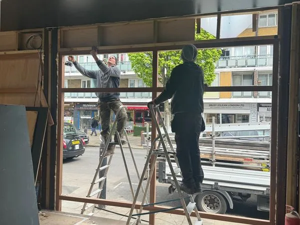 Steel frame glazed shopfront installation